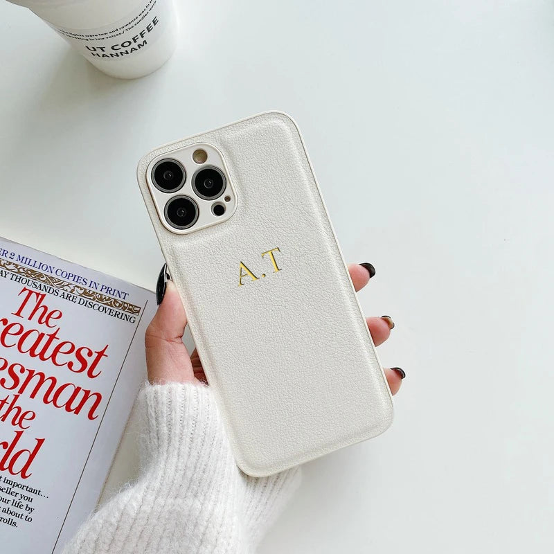 white case with letter A.T on it